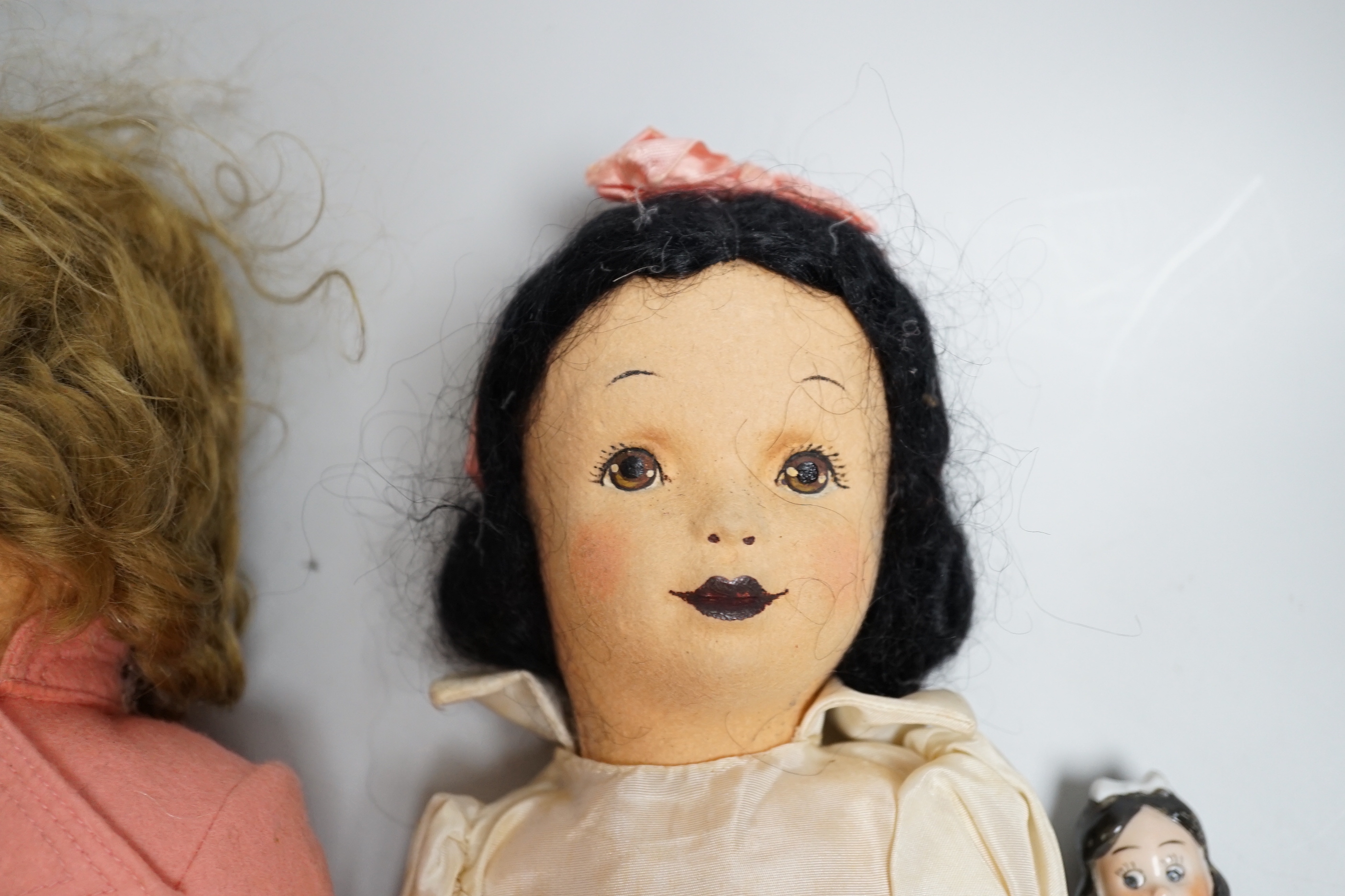 Chad Valley Princess Margaret and Snow White felt dolls and a porcelain figure of Snow White, tallest 45cm high (3)